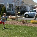 Tossing a ball to Daddy